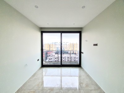 Квартира 1+1 с панорамным видом на море в новом комплексе в Махмутларе фото 16