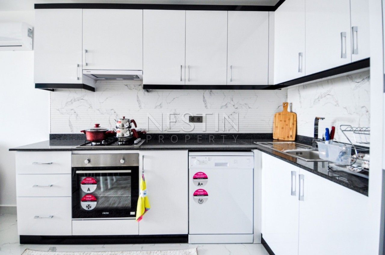 Квартиры 1+1 с мебелью в самом центре Махмутлара, вид на море фото 11