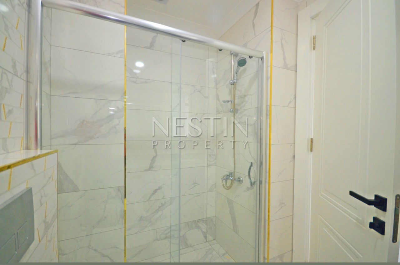 Квартира 1+1 в районе Авсаллар в новом жилом доме с видом на море фото 10