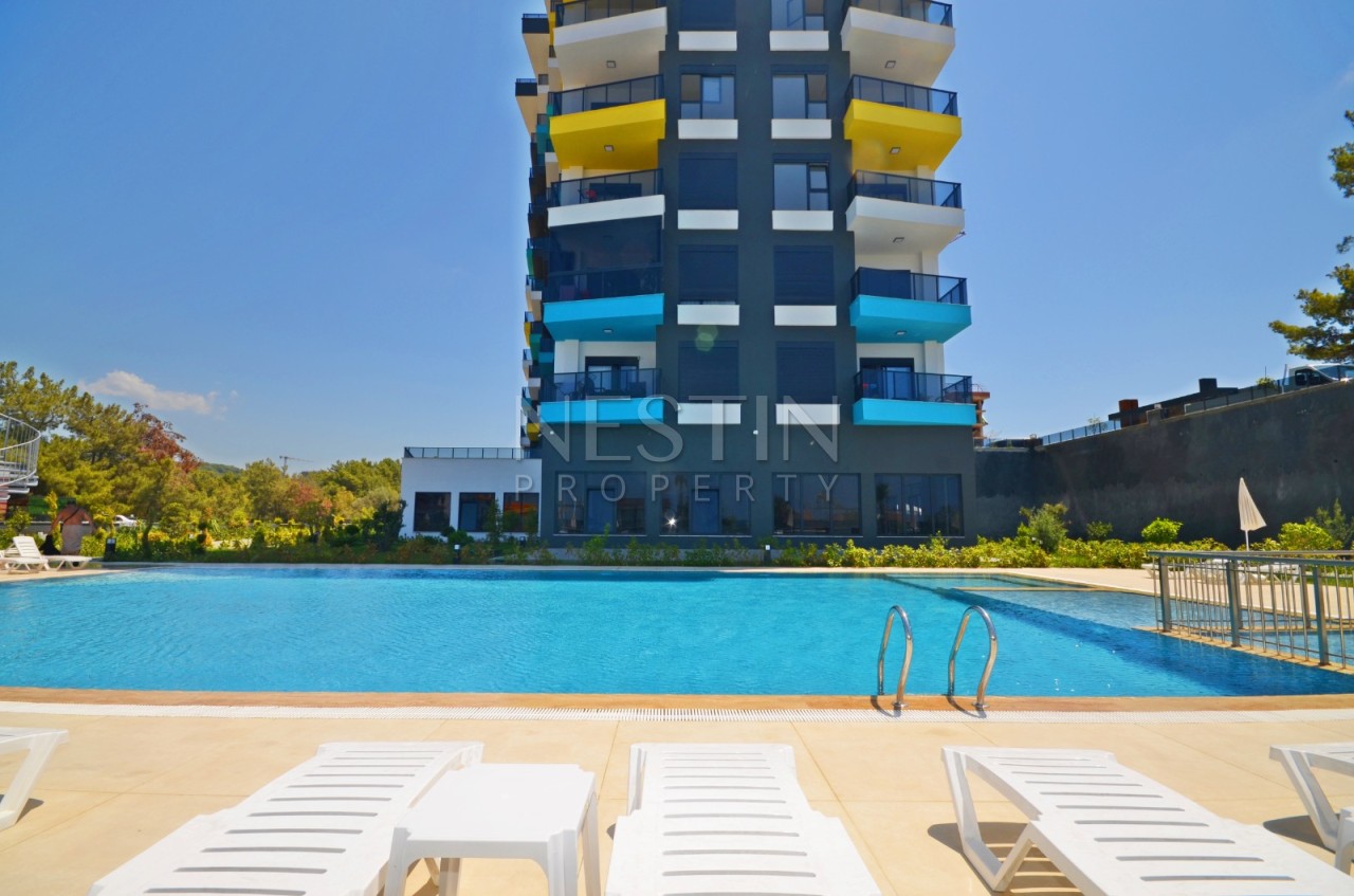 Квартира 1+1 в районе Авсаллар в новом жилом доме с видом на море фото 20