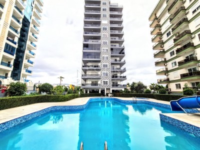 Апартаменты 1+1 с видом на море в новом комплексе района Махмутлар фото 1