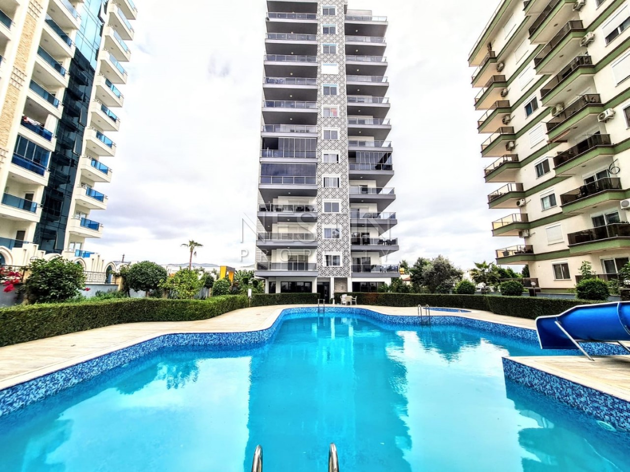 Апартаменты 1+1 с видом на море в новом комплексе района Махмутлар фото 1