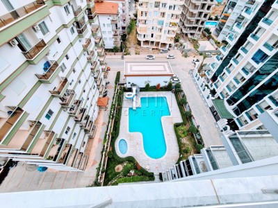 Апартаменты 1+1 с видом на море в новом комплексе района Махмутлар фото 3