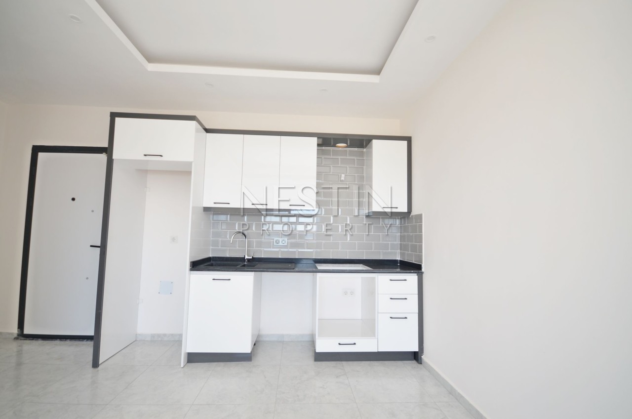 Квартира 1+1 в районе Авсаллар в новом доме с видом на море фото 3