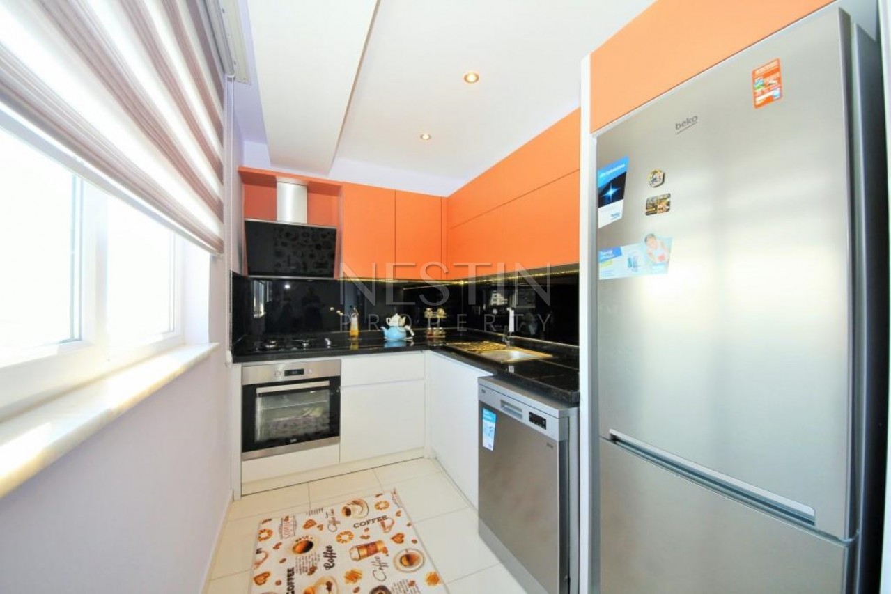 Апартаменты 2+1 в современном комплексе класса Люкс в центре Махмутлара фото 14