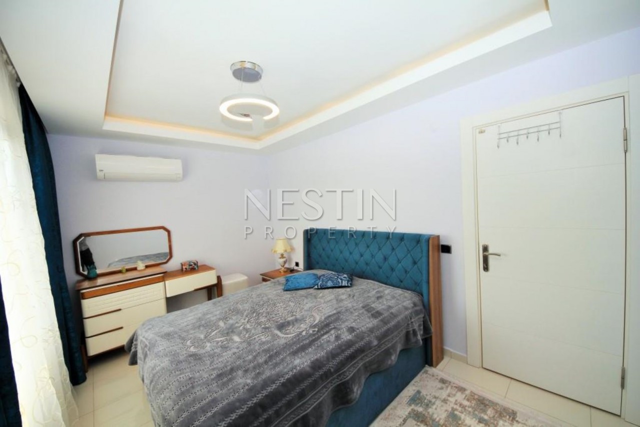 Апартаменты 2+1 в современном комплексе класса Люкс в центре Махмутлара фото 19