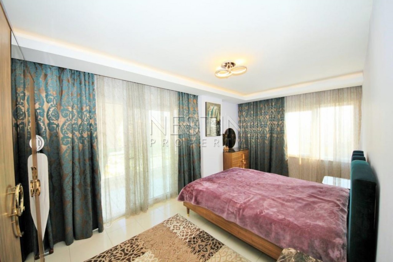 Апартаменты 2+1 в современном комплексе класса Люкс в центре Махмутлара фото 21