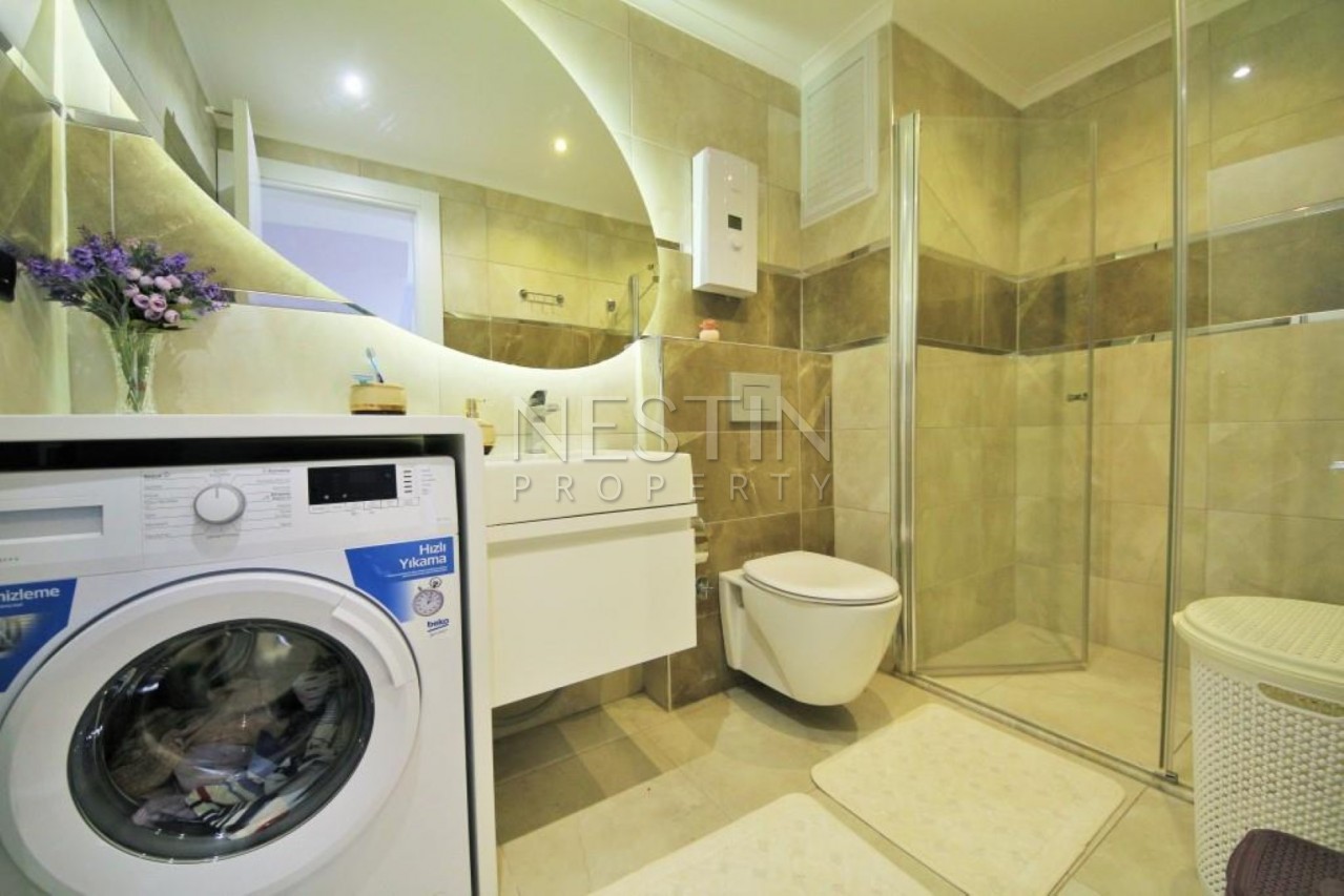 Апартаменты 2+1 в современном комплексе класса Люкс в центре Махмутлара фото 28