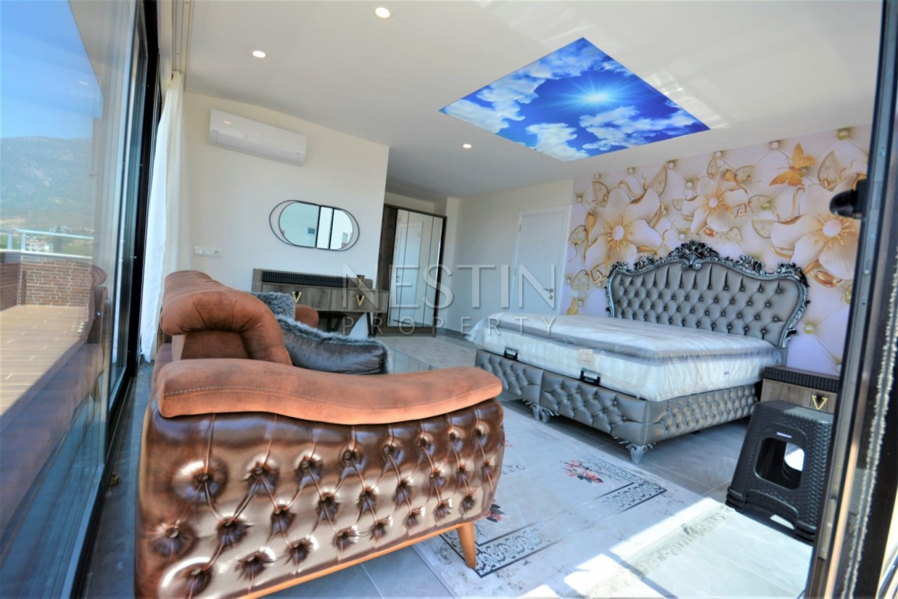 Просторный красивый пентхаус 3+1 в новой резиденции в Махмутларе фото 11