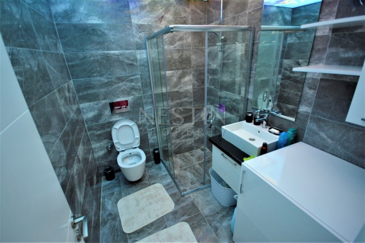 Просторный красивый пентхаус 3+1 в новой резиденции в Махмутларе фото 21