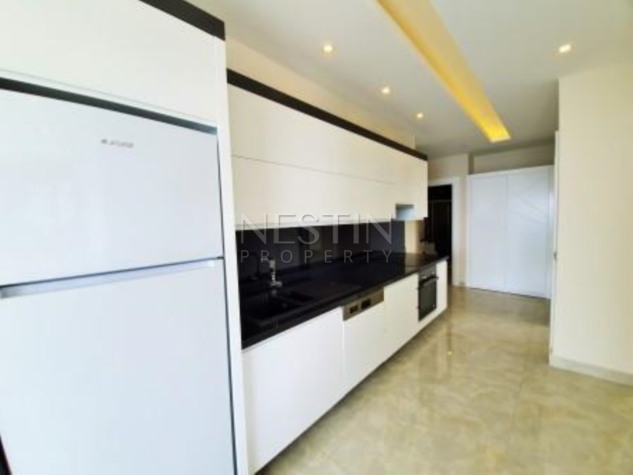 Квартира 2+1 с прямым видом на море в роскошном комплексе в Махмутларе фото 17