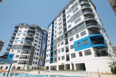 Апартаменты 2+1 в комплексе класса люкс в районе пляжа Клеопатры фото 2