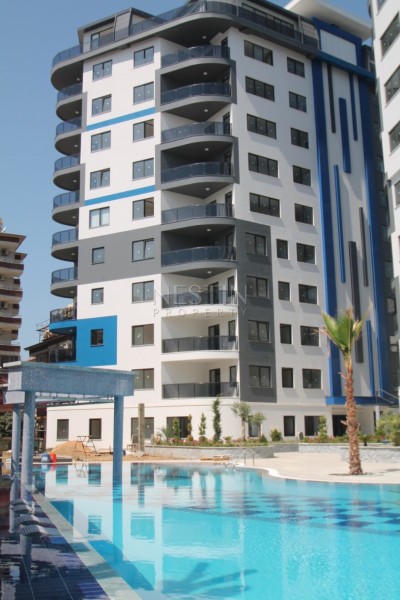 Апартаменты 2+1 в комплексе класса люкс в районе пляжа Клеопатры фото 7