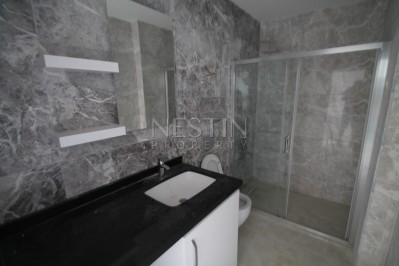 Апартаменты 2+1 в комплексе класса люкс в районе пляжа Клеопатры фото 27