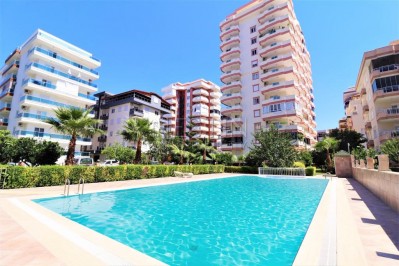 Меблированная квартира 2+1 в ухоженном комплексе в Махмутларе фото 1