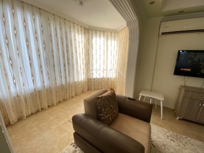 Квартира 2+1 по бюджетной цене на первой линии от моря в Махмутларе фото 10