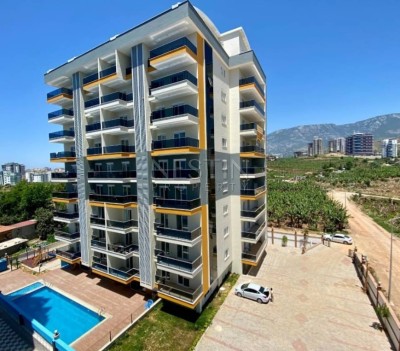 Квартира 1+1 в районе Махмутлар в новом доме в 700 м от Средиземного моря фото 1