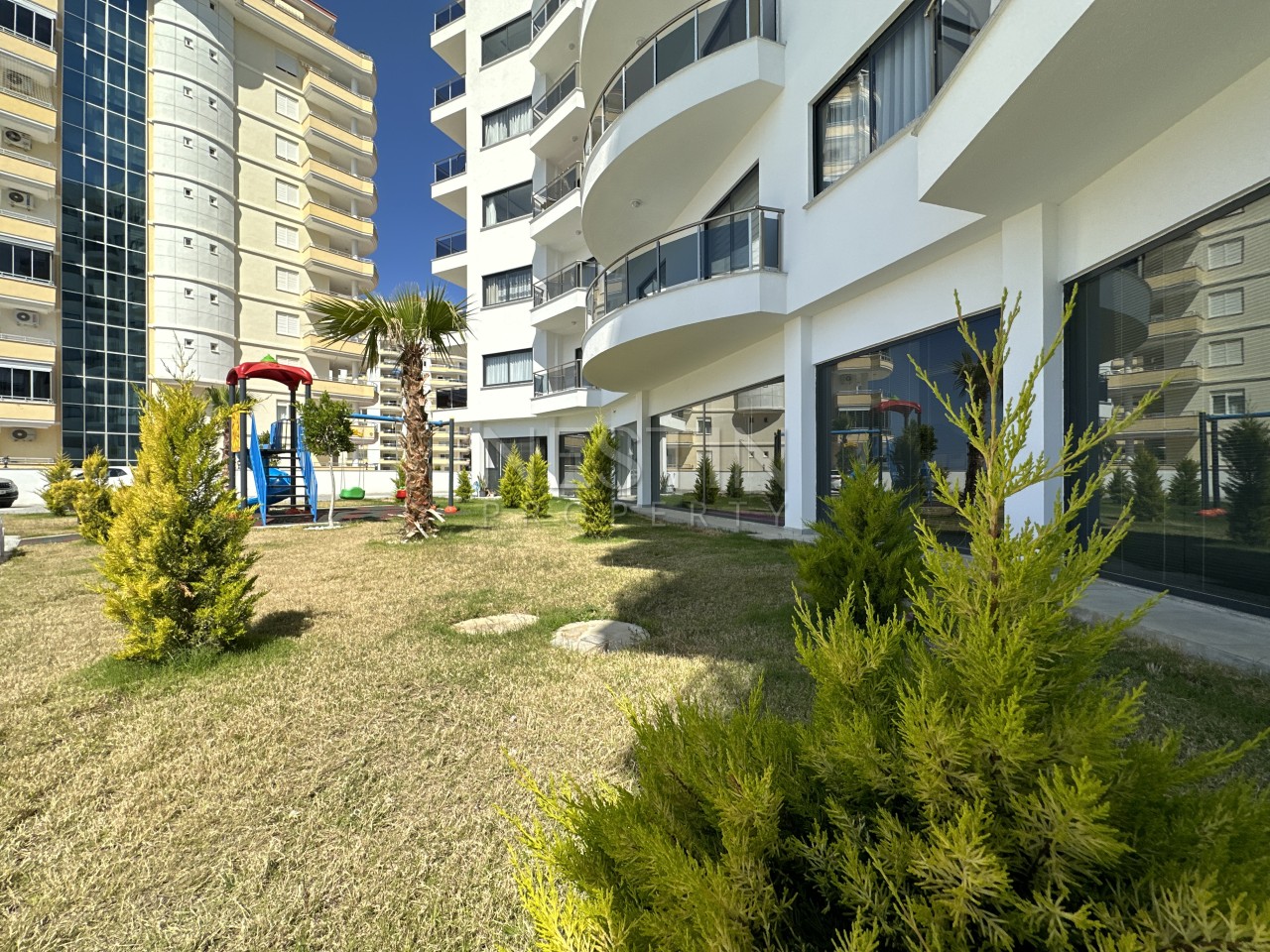 Квартира 1+1 в районе Махмутлар с видом на горы фото 27