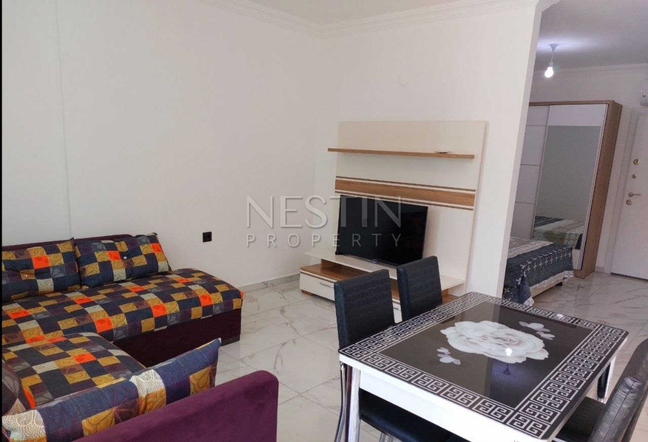 Квартира 1+1 в районе Авсаллар на стадии строительства в 700 м от Средиземного моря фото 3