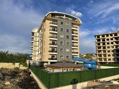 Квартира 1+1 в городе Газипаша в доме с видом на горы фото 1