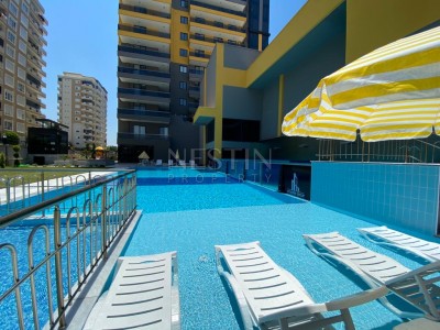 Новый комплекс апартаментов класса люкс в курортном районе Махмутлар фото 2
