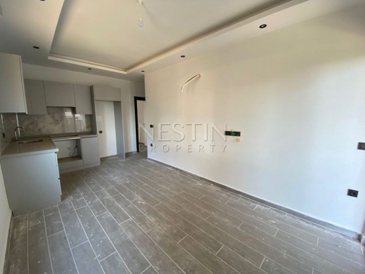 Квартира 1+1 в районе Махмутлар в новом жилом доме фото 2