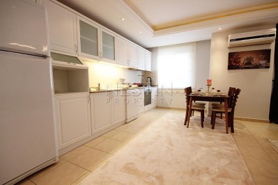 Меблированные апартаменты 2+1 в центре Махмутлара с видом на море в ухоженном комплексе фото 13