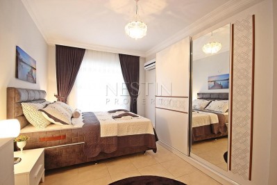 Меблированные апартаменты 2+1 в центре Махмутлара с видом на море в ухоженном комплексе фото 20