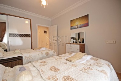 Меблированные апартаменты 2+1 в центре Махмутлара с видом на море в ухоженном комплексе фото 30