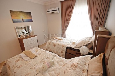 Меблированные апартаменты 2+1 в центре Махмутлара с видом на море в ухоженном комплексе фото 31