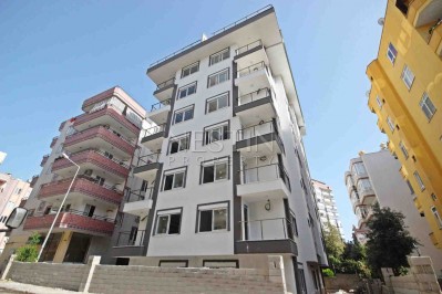 Абсолютно новая квартира 1+1 с панорамными окнами в центре Махмутлара фото 2