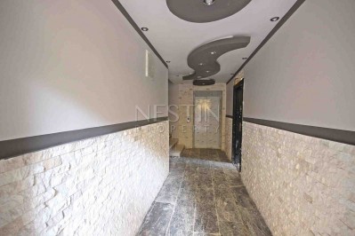 Абсолютно новая квартира 1+1 с панорамными окнами в центре Махмутлара фото 3