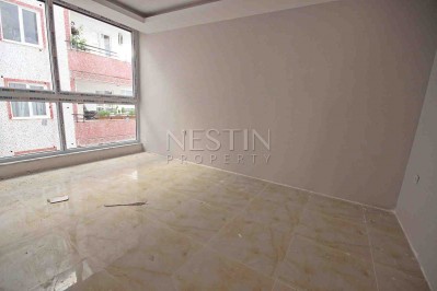 Абсолютно новая квартира 1+1 с панорамными окнами в центре Махмутлара фото 5