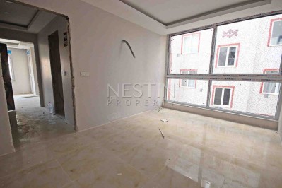 Абсолютно новая квартира 1+1 с панорамными окнами в центре Махмутлара фото 6