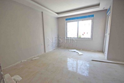 Абсолютно новая квартира 1+1 с панорамными окнами в центре Махмутлара фото 7