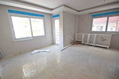 Абсолютно новая квартира 1+1 с панорамными окнами в центре Махмутлара фото 8