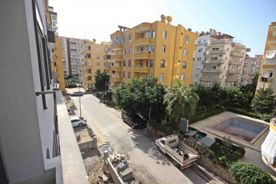 Абсолютно новая квартира 1+1 с панорамными окнами в центре Махмутлара фото 11