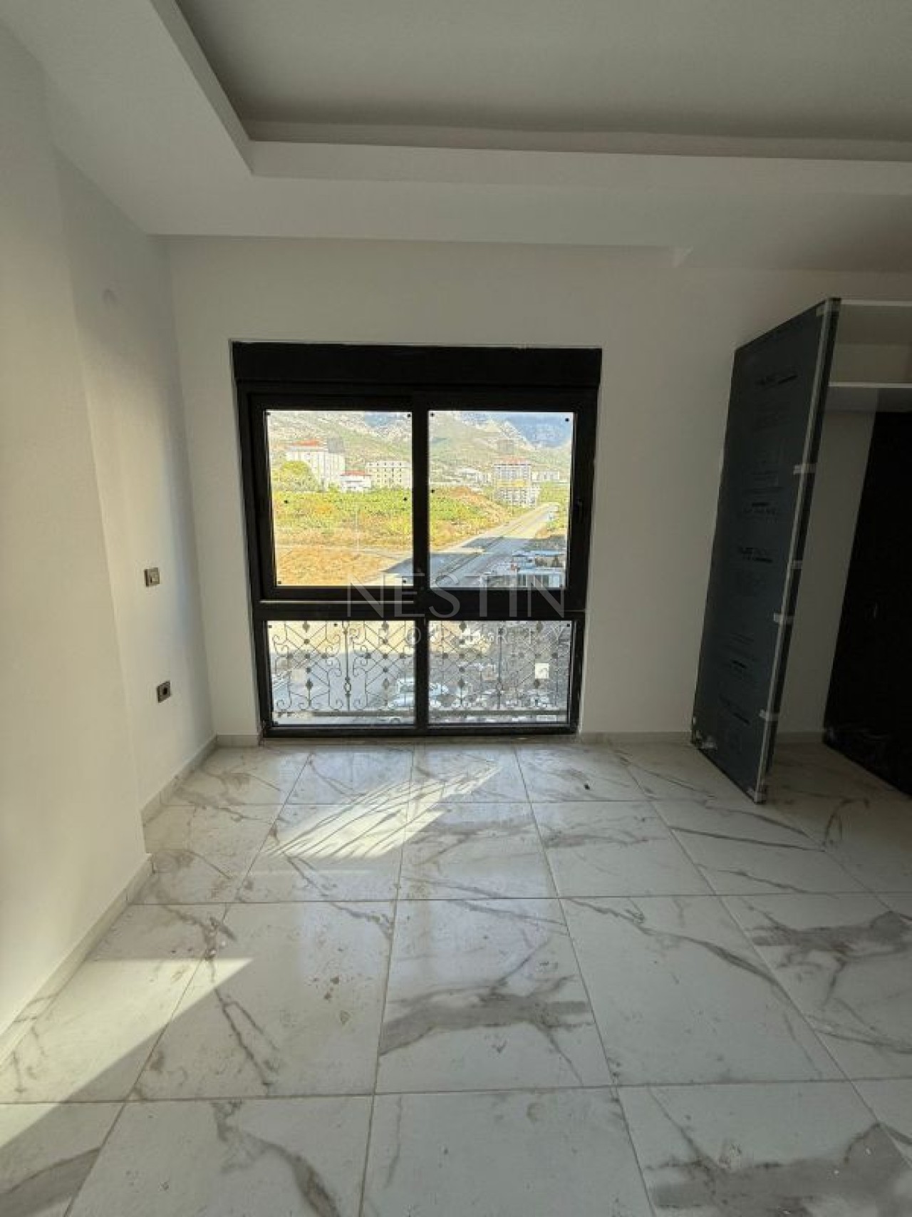 Квартира 1+1 в районе Махмутлар в новом жилом доме в 2000 м от моря фото 3