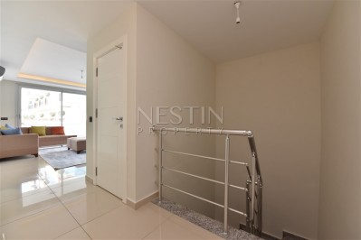 Двухуровневая квартира 2+1 с выходом в сад в Кестеле с мебелью фото 10