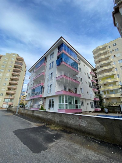 Апартаменты 1+1 в новом доме в Махмутларе по низкой цене фото 2