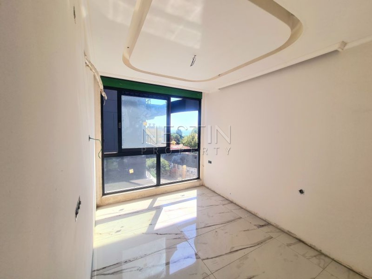 Hовый жилой комплекс на стадии строительства в городе Алания, в районе Кестель в 230 м от Средиземного моря фото 9