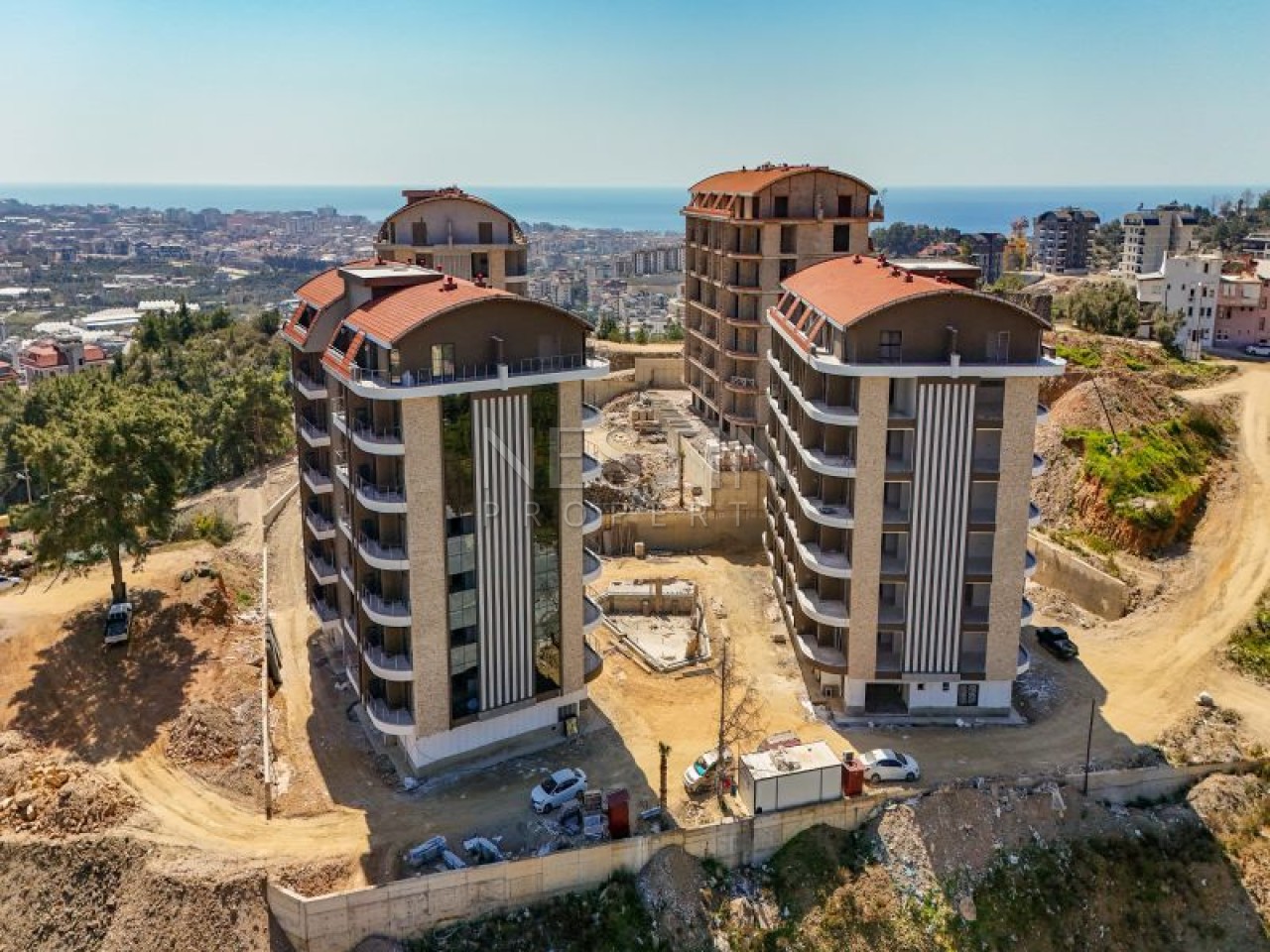 Hовый жилой комплекс на стадии строительства в центре Алании в районе Чиплаклы в 2800 метрах от Cредиземного моря. фото 2