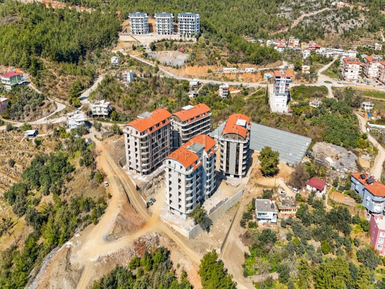 Hовый жилой комплекс на стадии строительства в центре Алании в районе Чиплаклы в 2800 метрах от Cредиземного моря. фото 5