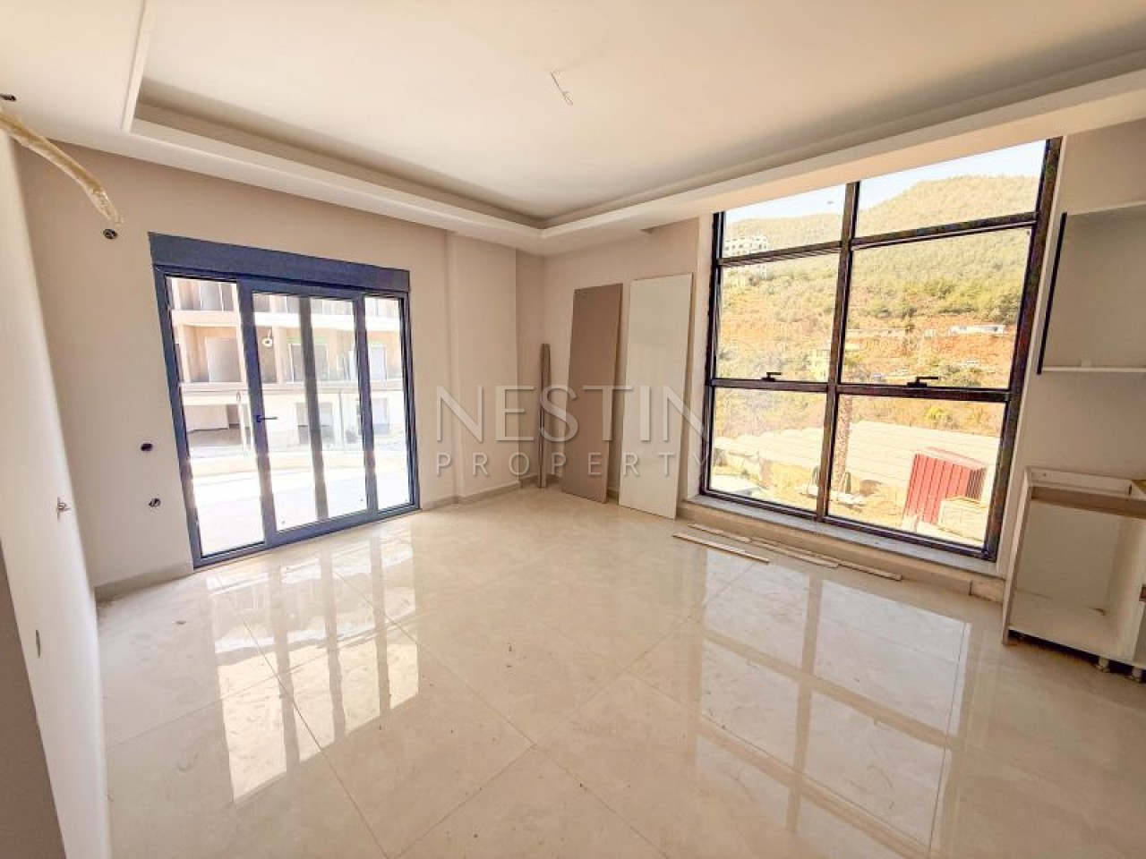 Hовый жилой комплекс на стадии строительства в центре Алании в районе Чиплаклы в 2800 метрах от Cредиземного моря. фото 8