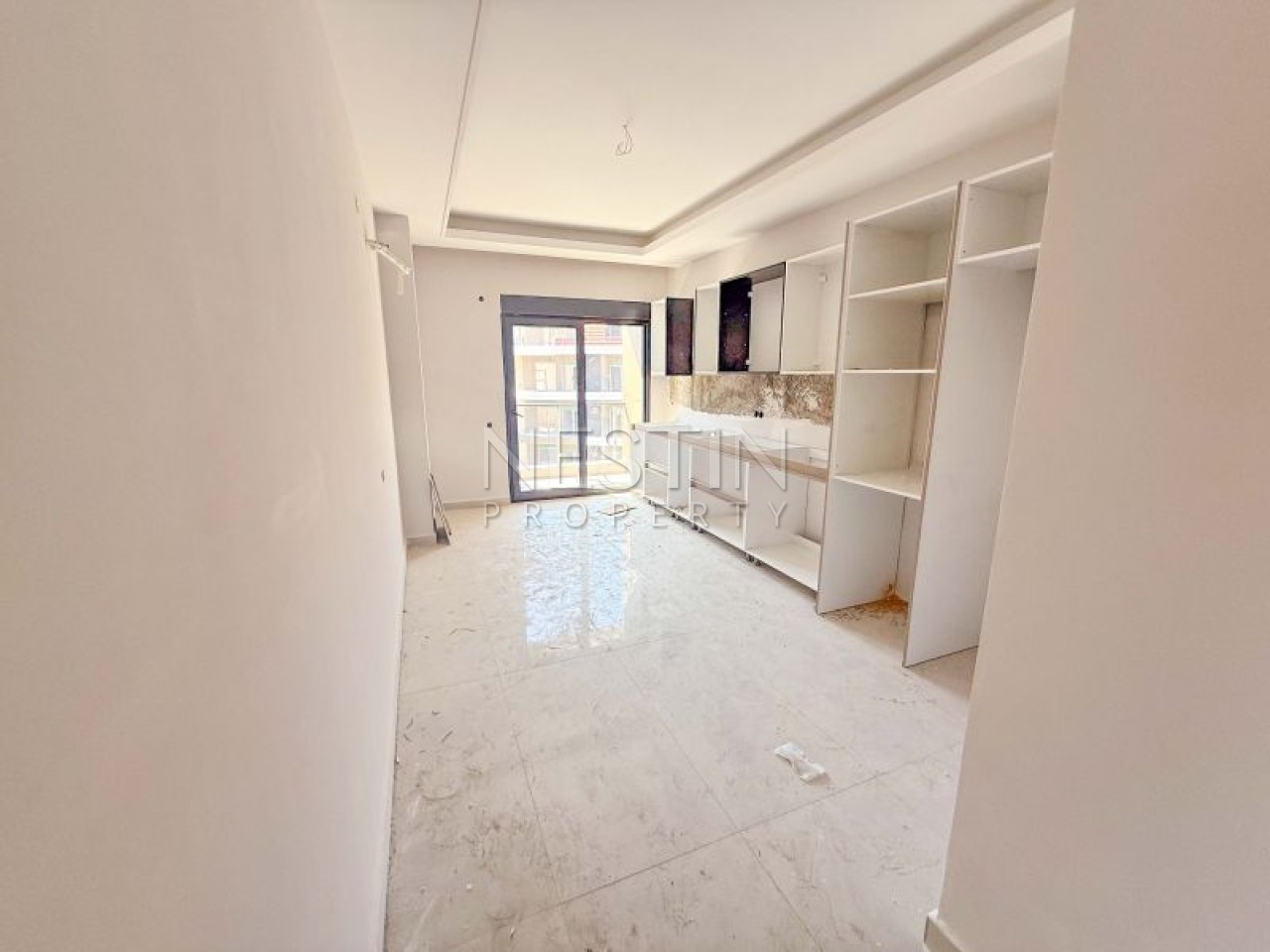 Hовый жилой комплекс на стадии строительства в центре Алании в районе Чиплаклы в 2800 метрах от Cредиземного моря. фото 12