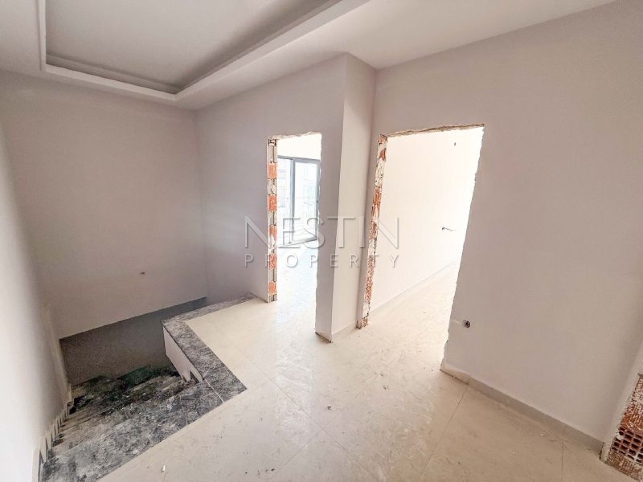 Hовый жилой комплекс на стадии строительства в центре Алании в районе Чиплаклы в 2800 метрах от Cредиземного моря. фото 21