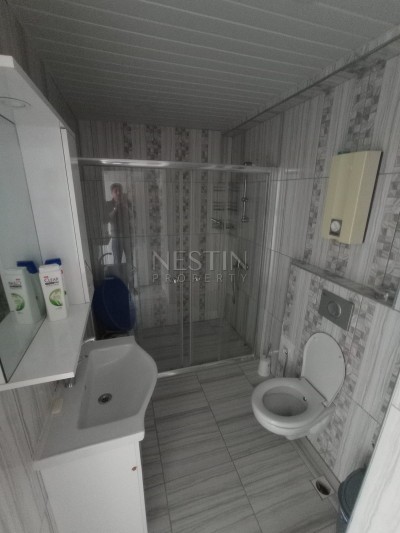 Меблированные апартаменты 1+1 в жилом комплексе в Махмутларе фото 12