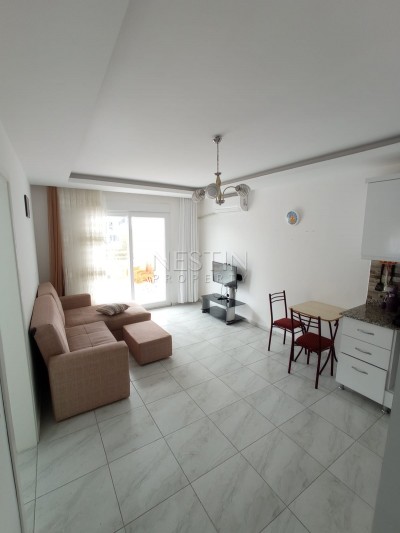 Меблированные апартаменты 1+1 в жилом комплексе в Махмутларе фото 6