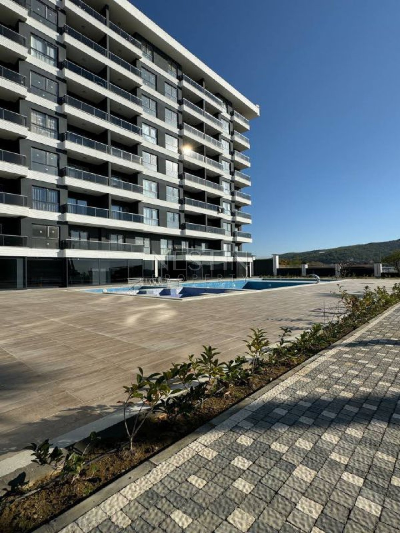 Квартира 1+1 в районе Демирташ в 2000 метрах от Средиземного моря фото 2