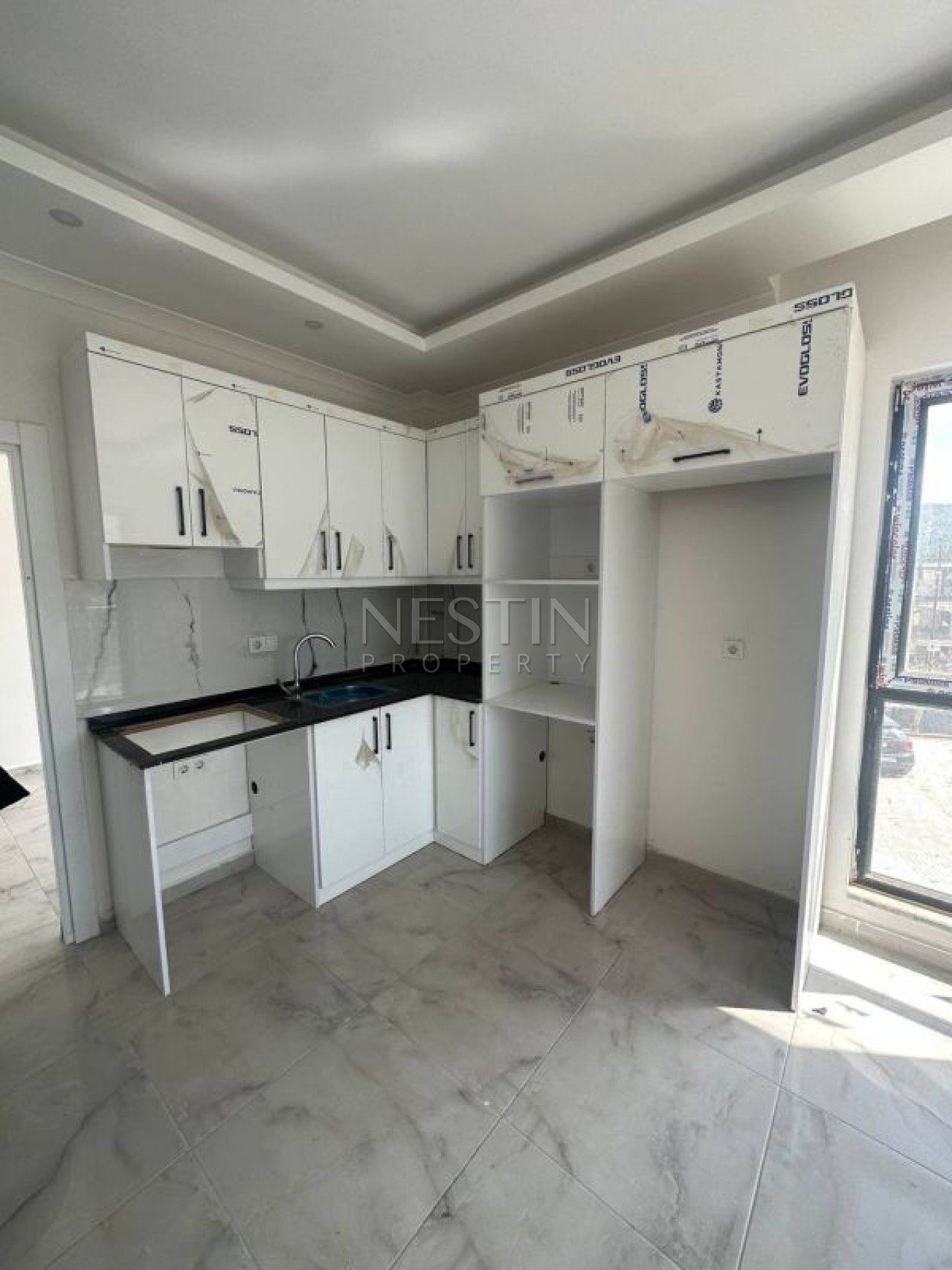 Квартира 1+1 в районе Демирташ в 2000 метрах от Средиземного моря фото 9